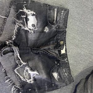 Black distressed shorts